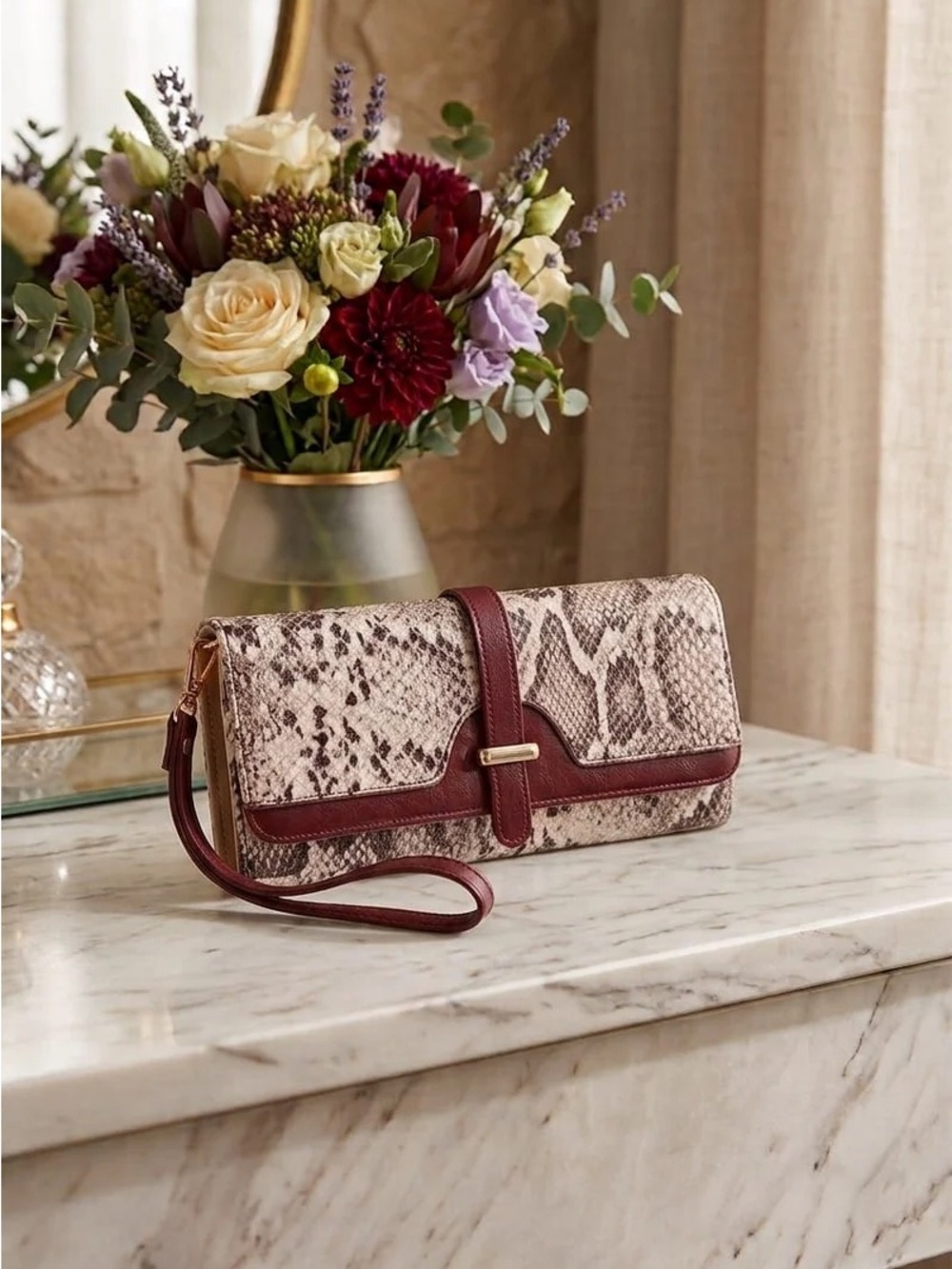 Brown Snake-Print Wristlet Clutch with Burgundy Trim
